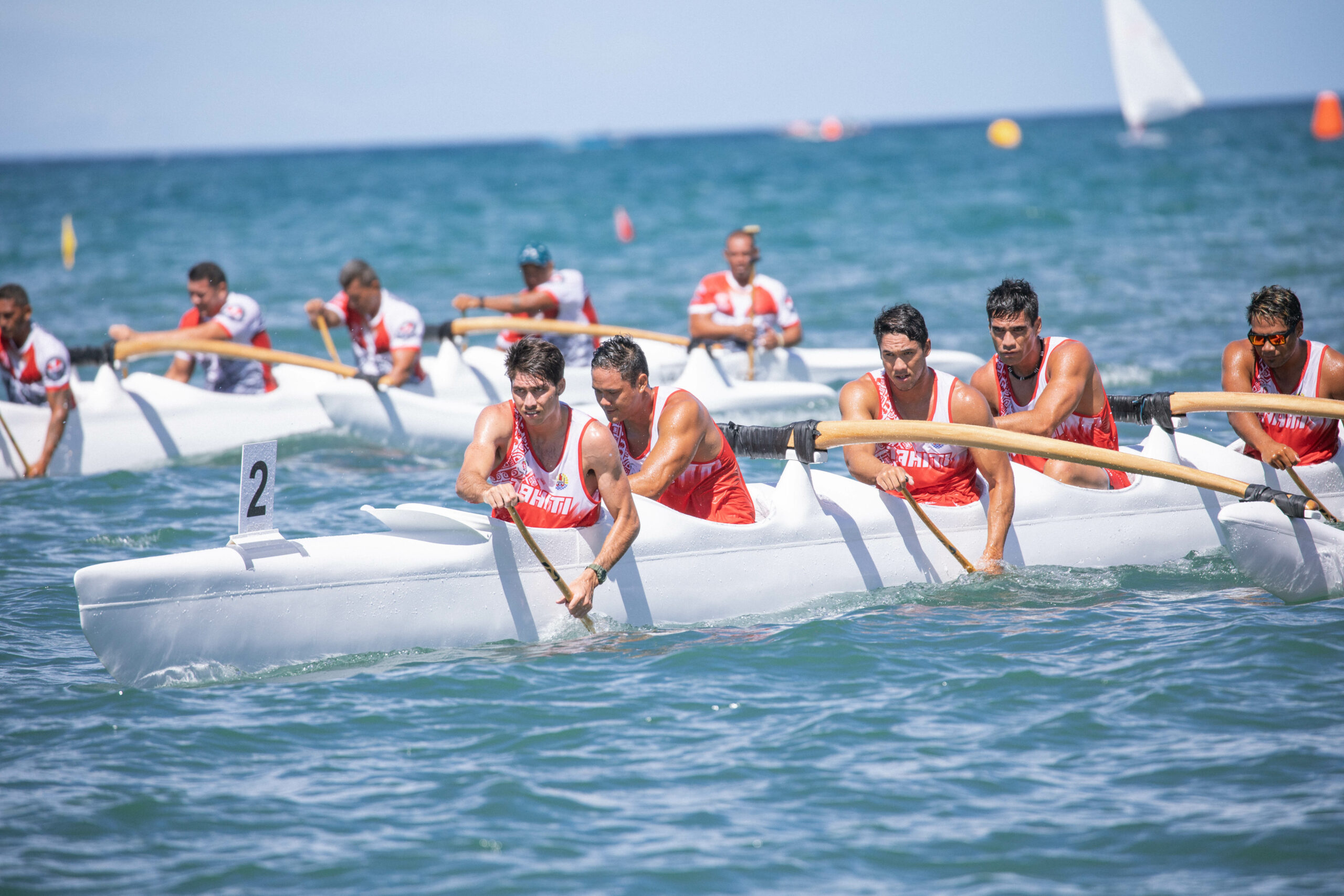 Men paddling in a va'a race