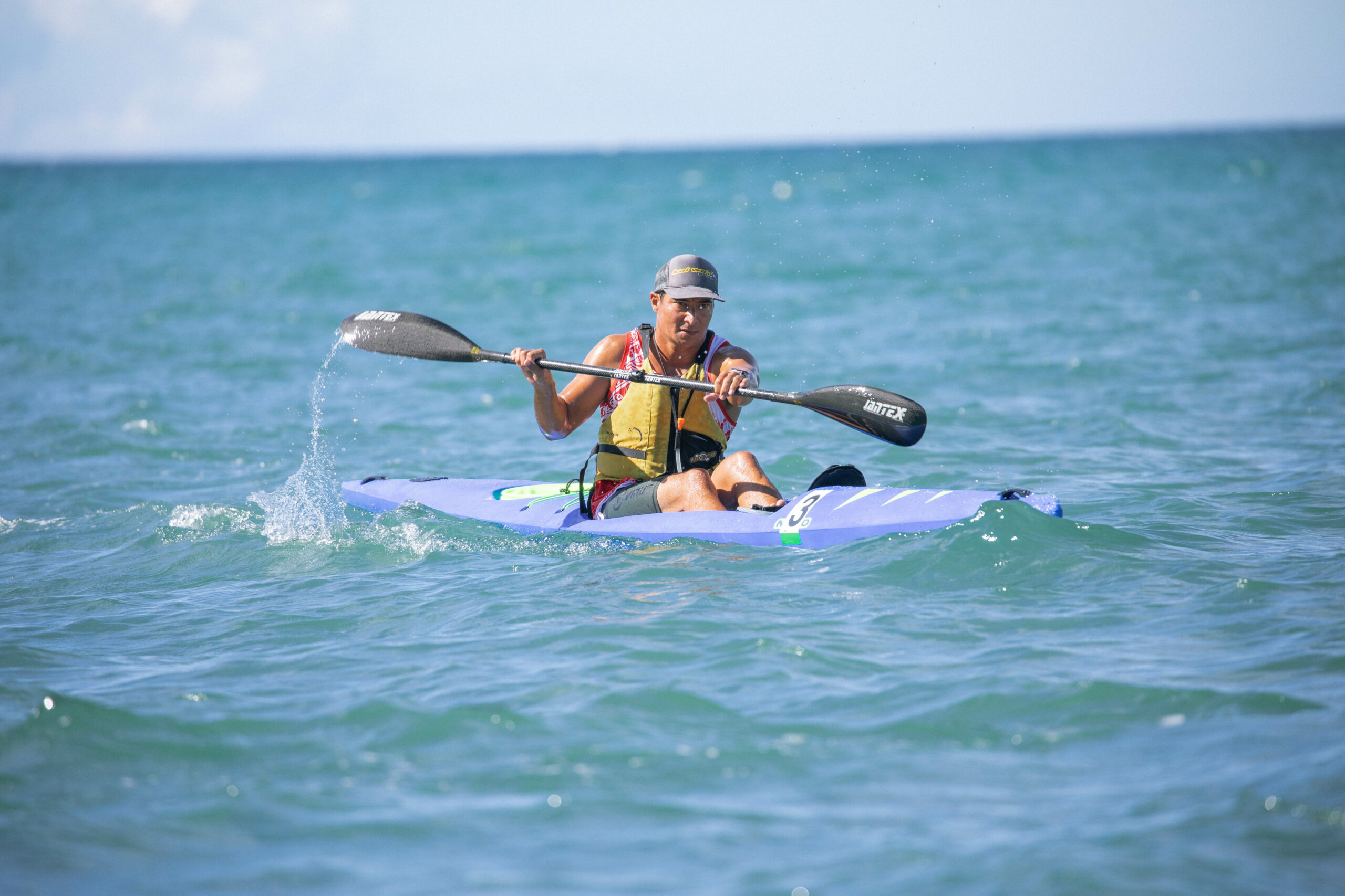 A kayak athlete paddling