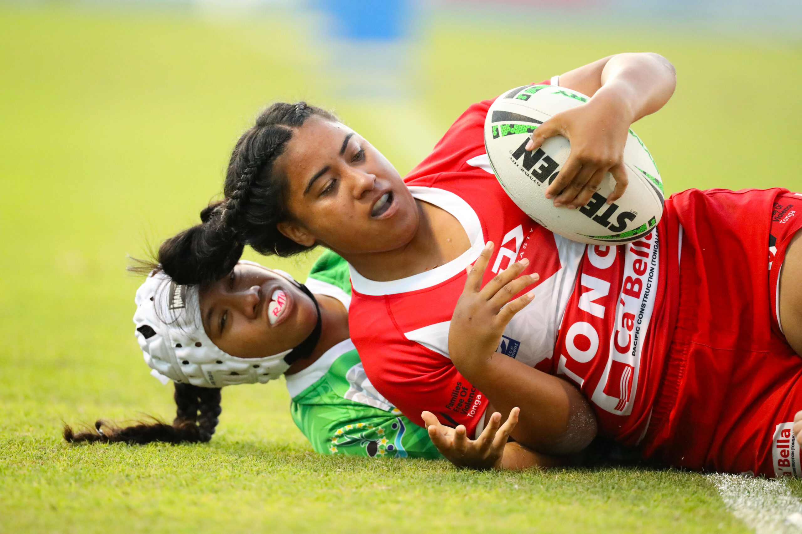 Women playing rugby league