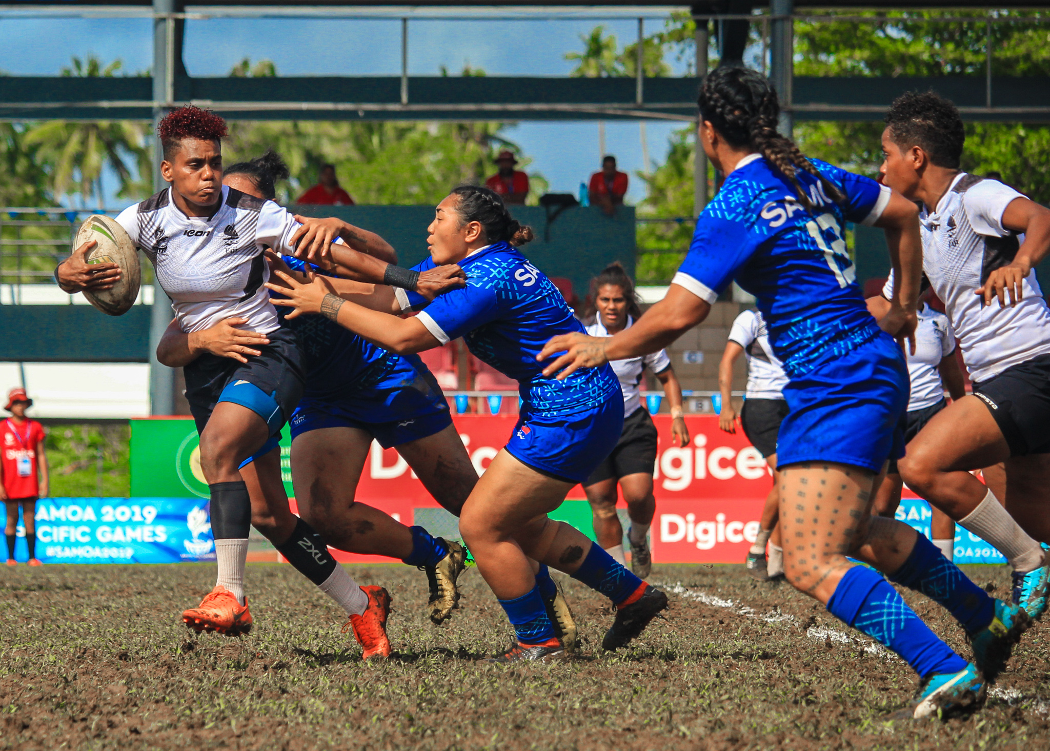 Women playing rugby league