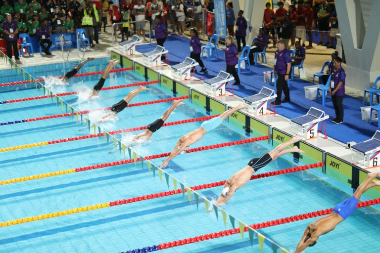 Old and new champions crowned on first night of swimming