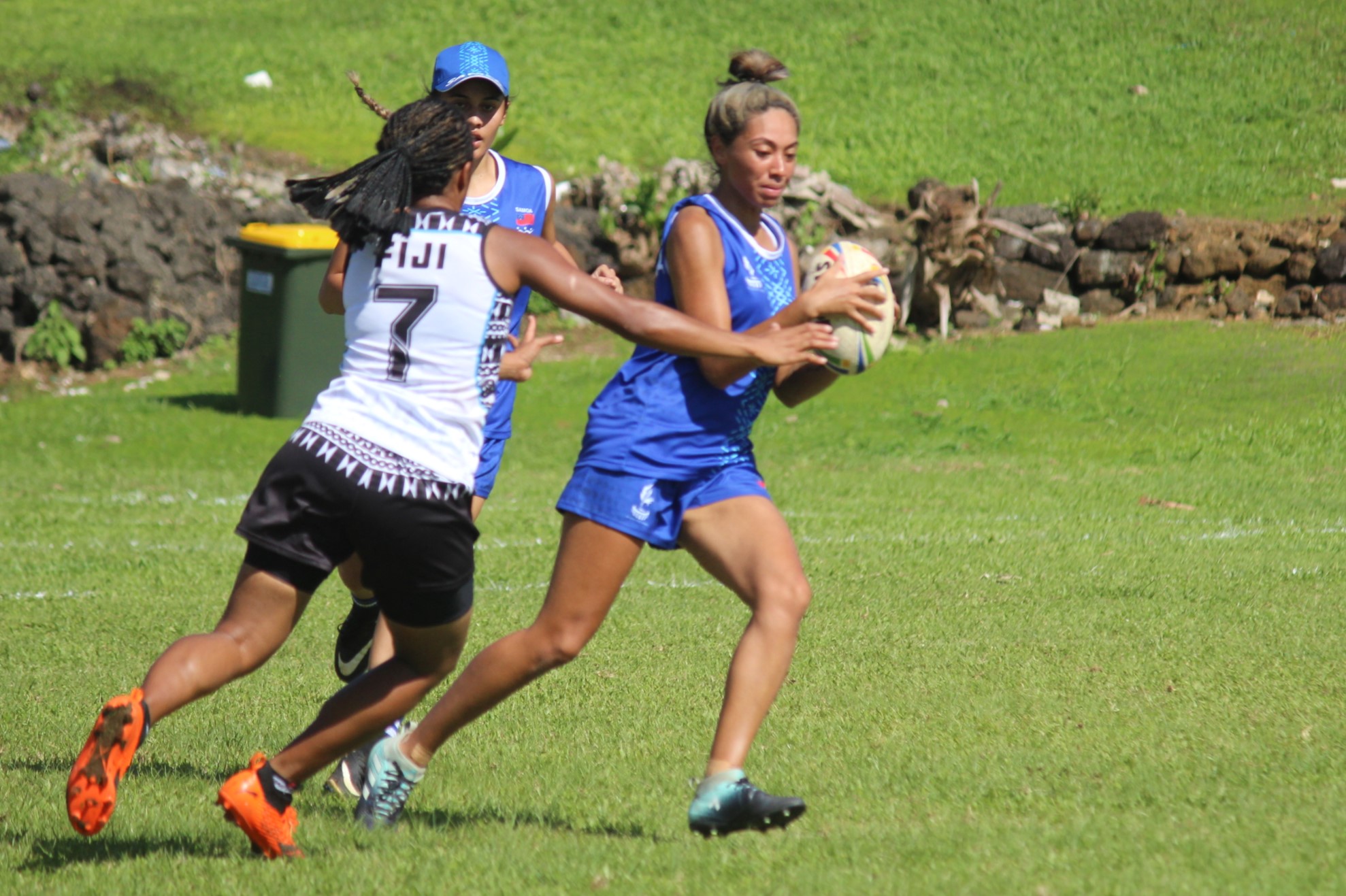 Women playing touch rugby