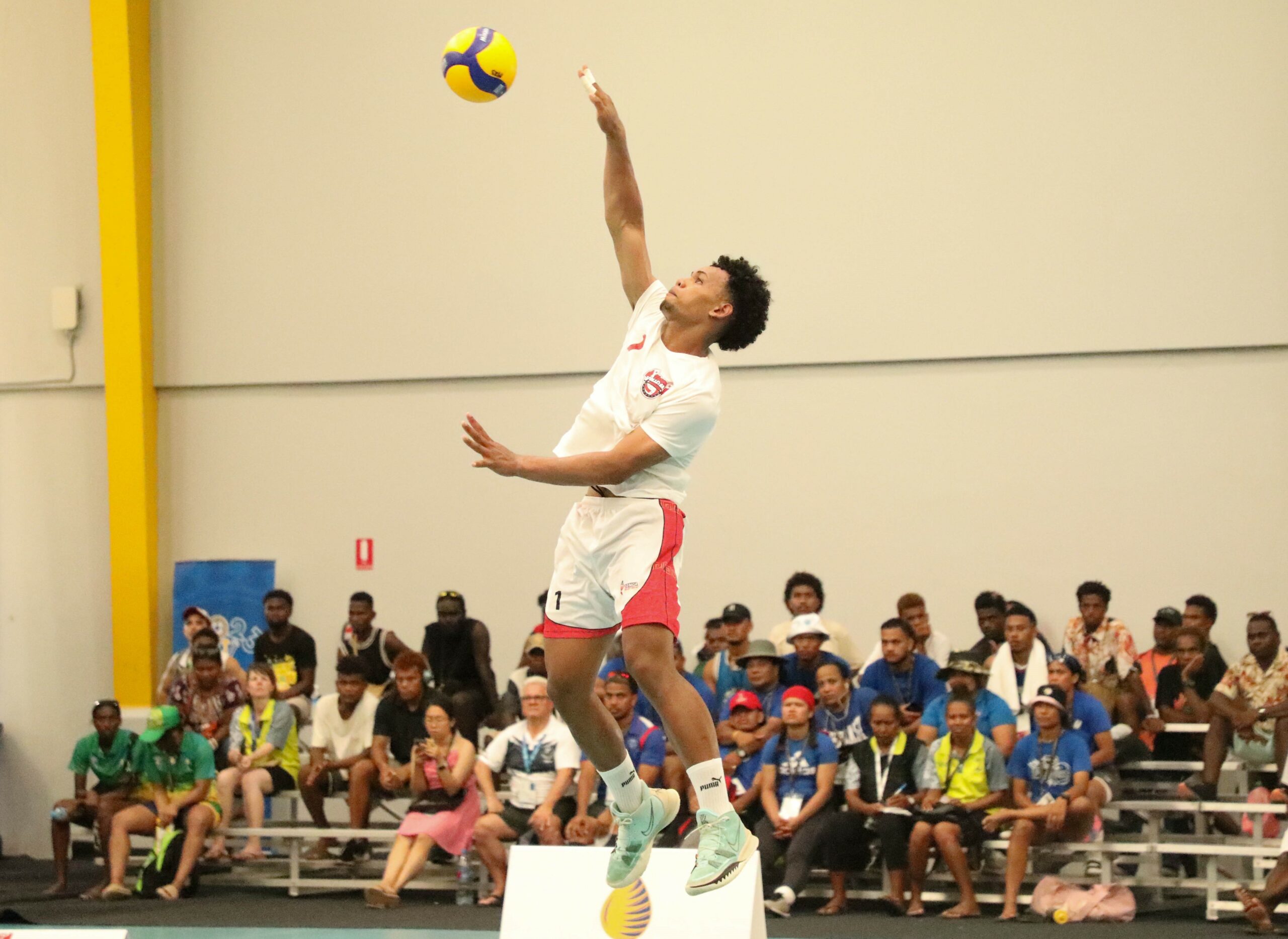A man playing volleyball