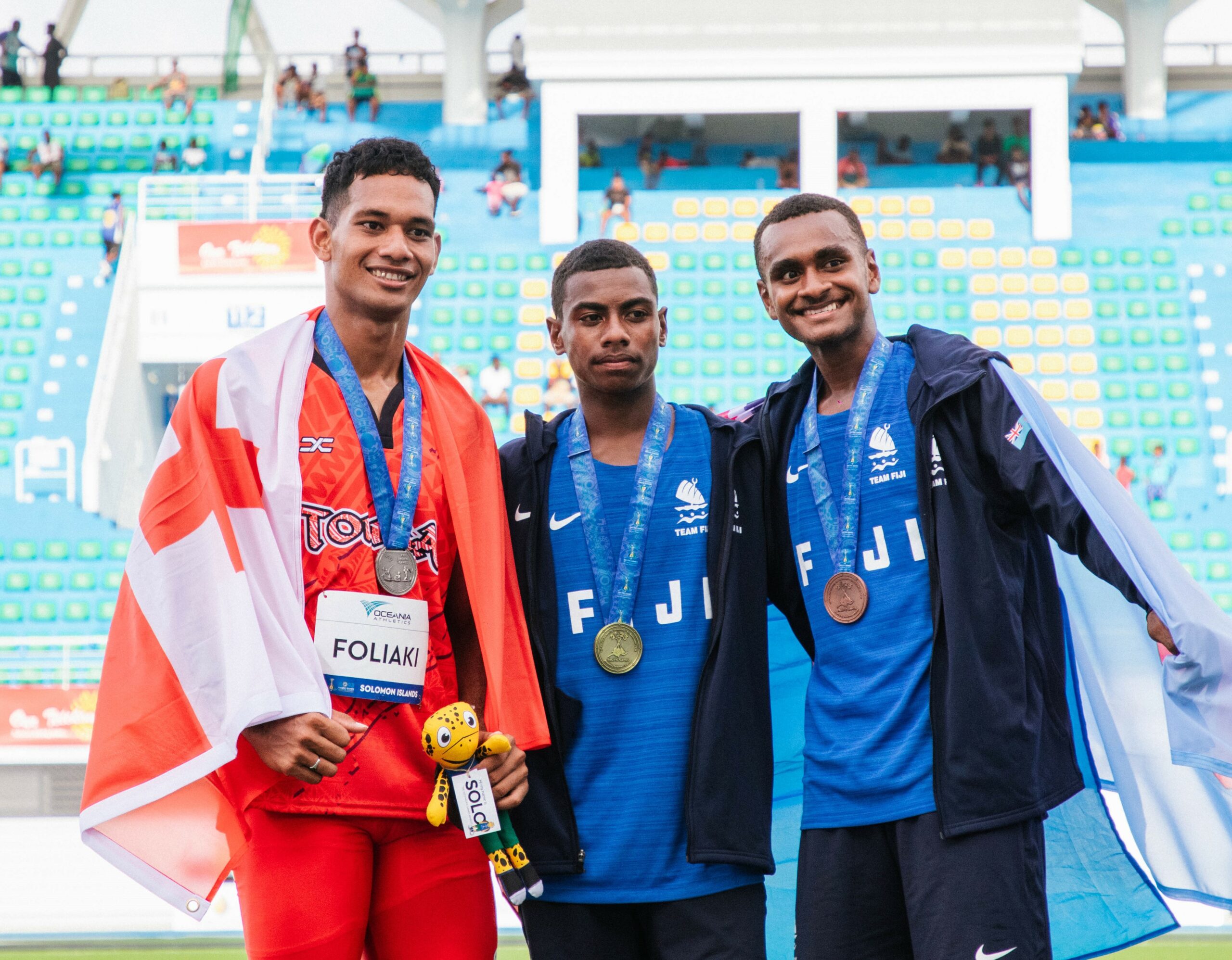 Men on a medal podium